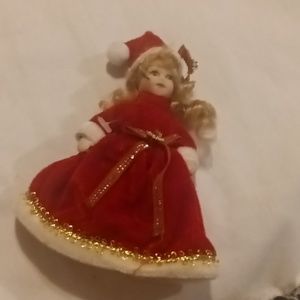 4 in porcelain Christmas doll